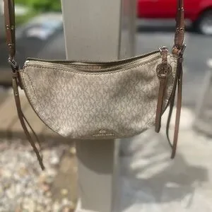 Shop Michael Kors Outlet Bags in 2026 Michael Kors Cream and Brown Shoulder Bag with Monogram Print display picture 1